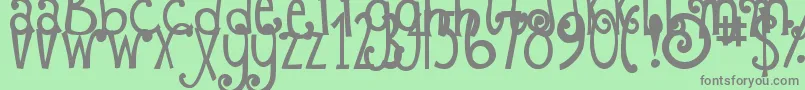 DjbFizzaWizzaWowza-Schriftart – Graue Schriften auf grünem Hintergrund