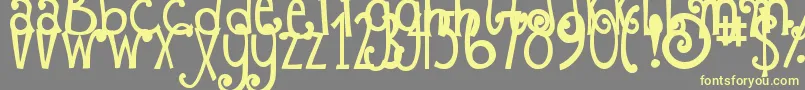 DjbFizzaWizzaWowza Font – Yellow Fonts on Gray Background