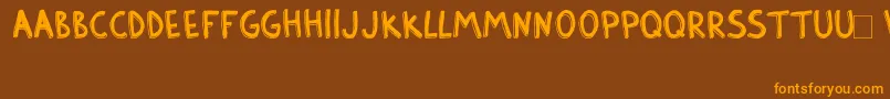 BarlowSolid Font – Orange Fonts on Brown Background