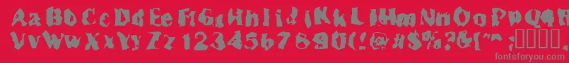 フォントInspecto – 赤い背景に灰色の文字