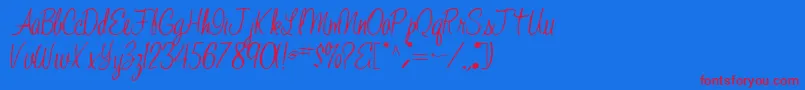 JelindaRegular Font – Red Fonts on Blue Background