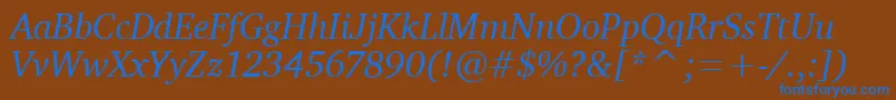 CharterItcTtItalic-Schriftart – Blaue Schriften auf braunem Hintergrund