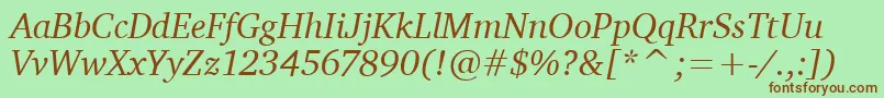 Fonte CharterItcTtItalic – fontes marrons em um fundo verde