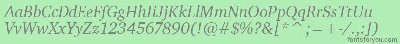 フォントCharterItcTtItalic – 緑の背景に灰色の文字