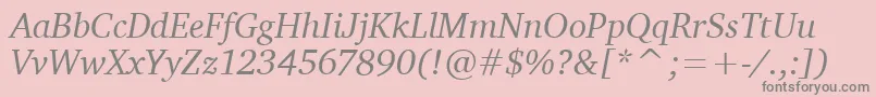 CharterItcTtItalic-fontti – harmaat kirjasimet vaaleanpunaisella taustalla