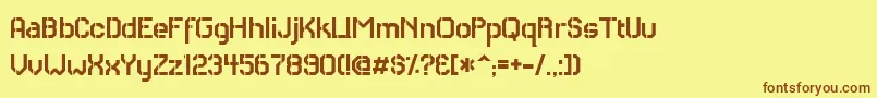 フォントRhcas – 茶色の文字が黄色の背景にあります。