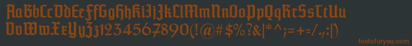 Więcej informacji o czcionce Typographertextur Czcionka Typographertextur – brązowe czcionki na czarnym tle