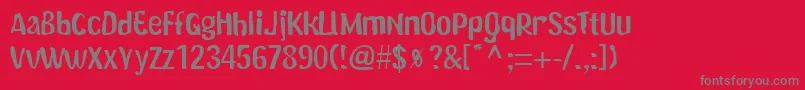 フォントDoggyRegular – 赤い背景に灰色の文字