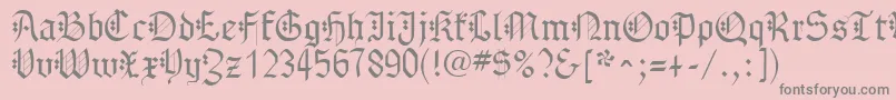 GothenburgFraktur-fontti – harmaat kirjasimet vaaleanpunaisella taustalla