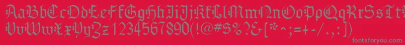 GothenburgFraktur-fontti – harmaat kirjasimet punaisella taustalla
