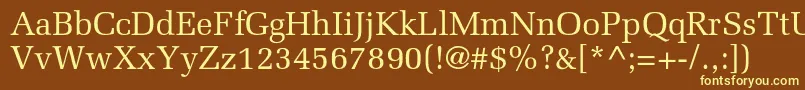 Agmelaniec-fontti – keltaiset fontit ruskealla taustalla