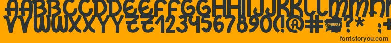 Fonte Marela – fontes pretas em um fundo laranja