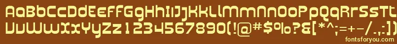 Plasma07-fontti – keltaiset fontit ruskealla taustalla