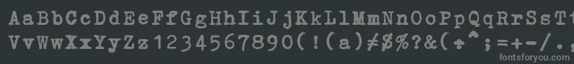 フォントErikaOrmig – 黒い背景に灰色の文字