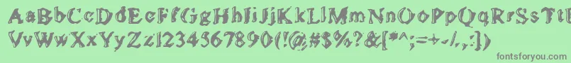 フォントGolds – 緑の背景に灰色の文字