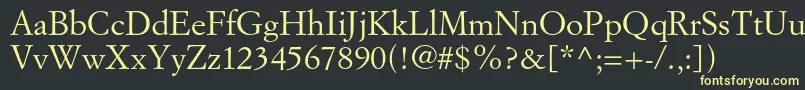 Simoncinigaramondstd Font – Yellow Fonts on Black Background