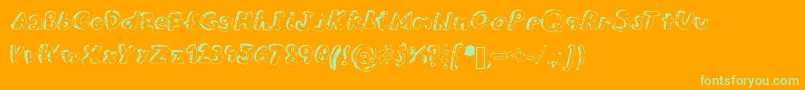 Overdue-Schriftart – Grüne Schriften auf orangefarbenem Hintergrund