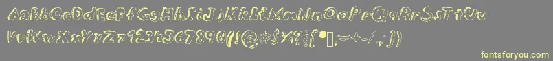 Overdue Font – Yellow Fonts on Gray Background