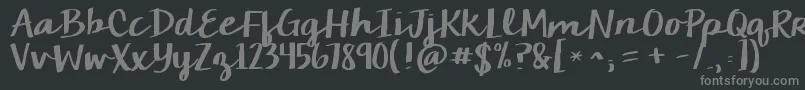 フォントKgcamdenmarketscript – 黒い背景に灰色の文字