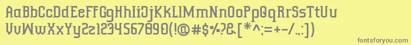 フォントOutromoro – 黄色の背景に灰色の文字