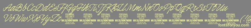 HoneymoonPersonal Font – Yellow Fonts on Gray Background