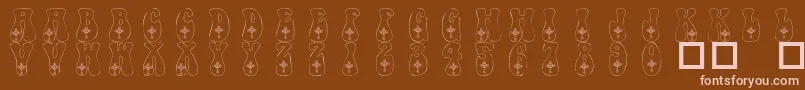 101CelticKnotDeco-Schriftart – Rosa Schriften auf braunem Hintergrund