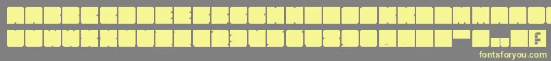 More about KasualBloks Font KasualBloks Font – Yellow Fonts on Gray Background