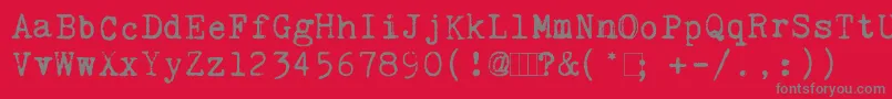 Czcionka KingthingsTrypewriter – szare czcionki na czerwonym tle