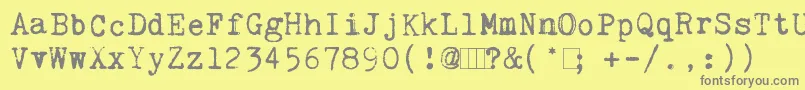 フォントKingthingsTrypewriter – 黄色の背景に灰色の文字