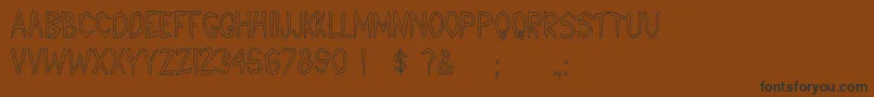 Pccatawanhc Font – Black Fonts on Brown Background