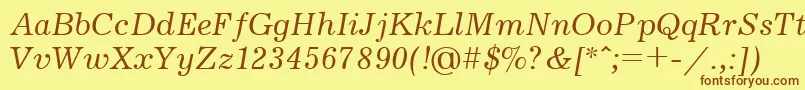 フォントJrn56 – 茶色の文字が黄色の背景にあります。