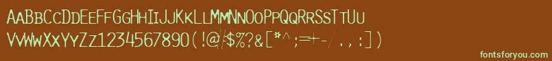 フォントPureLightcap – 緑色の文字が茶色の背景にあります。