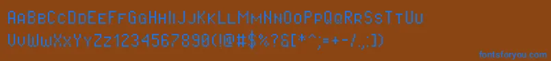 Czcionka Pixeloperatorsc – niebieskie czcionki na brązowym tle