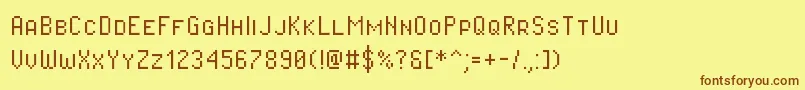 Шрифт Pixeloperatorsc – коричневые шрифты на жёлтом фоне