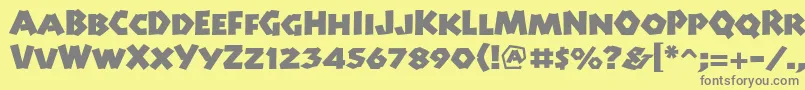Manitolpstd-fontti – harmaat kirjasimet keltaisella taustalla