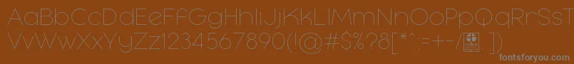 Шрифт MayekaThinDemo – серые шрифты на коричневом фоне