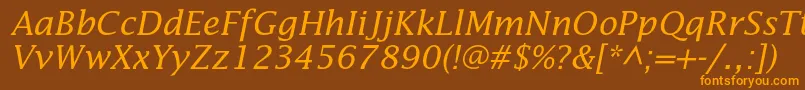 フォントLucidastdItalic – オレンジ色の文字が茶色の背景にあります。