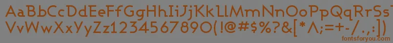 フォントAshbm – 茶色の文字が灰色の背景にあります。