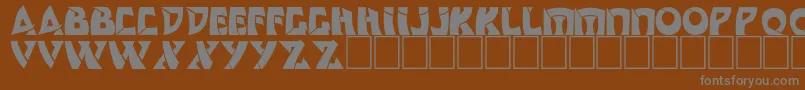 Dscomedyc Font – Gray Fonts on Brown Background