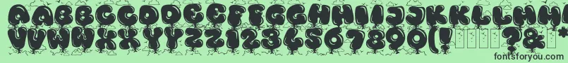 Fonte KingthingsBloone – fontes pretas em um fundo verde