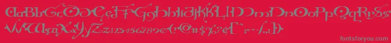 フォントHollyjinglesolidexpand – 赤い背景に灰色の文字