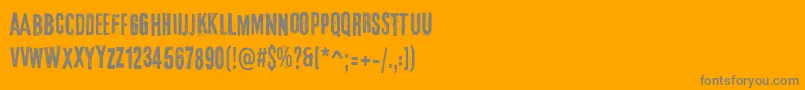 フォントElTercerHombre – オレンジの背景に灰色の文字