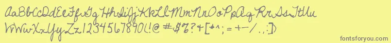 フォントNeverletgo – 黄色の背景に灰色の文字