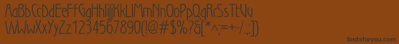 Wienlightc Font – Black Fonts on Brown Background