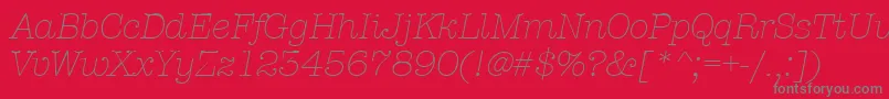 Fonte AmtypewriteritcttLightitalic – fontes cinzas em um fundo vermelho