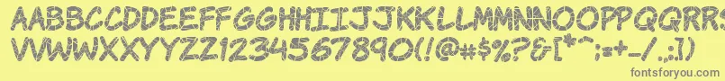 KomikaKrak Font – Gray Fonts on Yellow Background