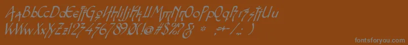 SnotmasterVItalic-fontti – harmaat kirjasimet ruskealla taustalla