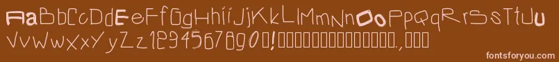 Czcionka Pwirregular2 – różowe czcionki na brązowym tle