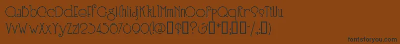 Speen3 Font – Black Fonts on Brown Background