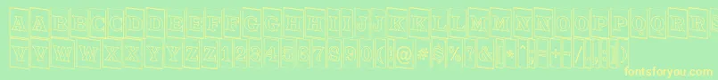 ATrianglercmotldn Font – Yellow Fonts on Green Background